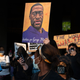People march following the guilty verdict in the trial of Derek Chauvin on April 20, 2021, in Atlanta, Georgia.